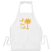 Say hello with the Yellow Hey Y'all Palmetto Moon BBQ Apron. It features the South Carolina palmetto moon.