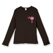 Buy a Pink Palmetto Moon Women's Fitted Baby Rib Long Sleeve Tee featuring a smaller palmetto printed on the left chest area. The palmetto moon is a symbol of South Carolina pride.