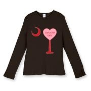 A Candy Heart Palmetto Moon Women's Fitted Baby Rib Long Sleeve Tee for a Carolina Girl! Perfect for Valentine's Day, it features a pink candy heart on the South Carolina Palmetto Moon with Carolina Girl.