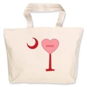 A Candy Heart Palmetto Moon for an Angel! Perfect for Valentine's Day, it features a pink candy heart on the South Carolina Palmetto Moon with Angel.