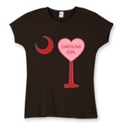 A Candy Heart Palmetto Moon Women's Fitted Baby Rib Tee for a Carolina Girl! Perfect for Valentine's Day, it features a pink candy heart on the South Carolina Palmetto Moon with Carolina Girl.