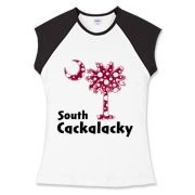 Garnet and Black Polka Dots South Cackalacky Palmetto Moon Women's Fitted Cap Sleeve Tee features a Polka Dot South Carolina palmetto moon logo in garnet.