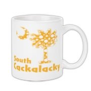 Yellow Polka Dots South Cackalacky Palmetto Moon Coffee Mug features a Polka Dot South Carolina palmetto moon logo in yellow.
